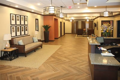 Interior view of a bright reception area with seating