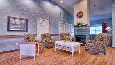 Cozy common area with comfortable seating and a fireplace