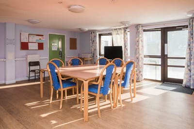 Interior common area with tables and chairs