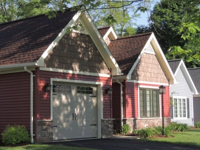 Exterior view of cottages surrounded by greenery