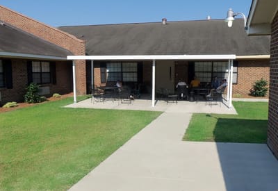 Residents enjoying time outdoors at the facility