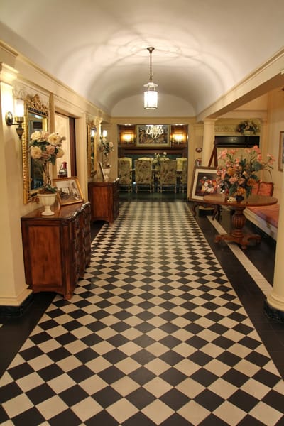 Interior hallway with decorative elements and checkered flooring