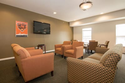 Common area seating in a bright lounge