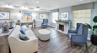 Bright, inviting common area with seating and decor