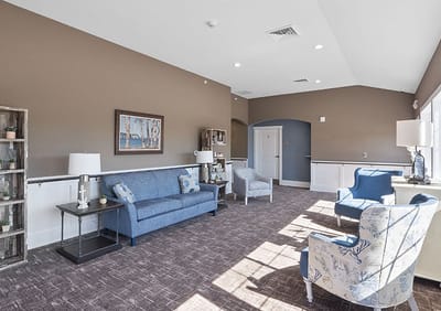 Bright common area with seating and decor