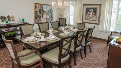 Elegant dining room set up for a meal.