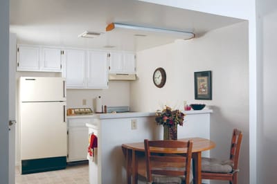 Bright kitchen area with a dining table