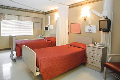 Two twin beds in a cozy resident room