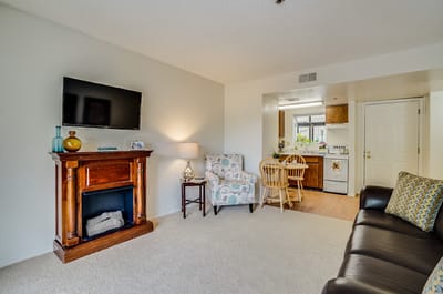 Cozy living room area in a senior facility unit