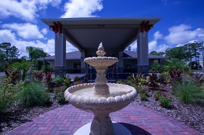 Fountain in front of Majestic Gardens Living entrance