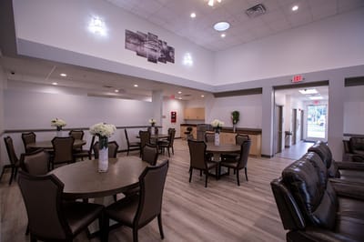 Bright common area with tables and chairs