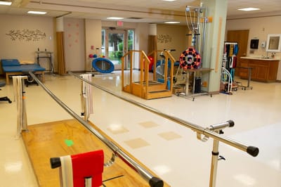 Interior view of a physical therapy room with equipment