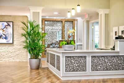 Reception area with modern decor and plants