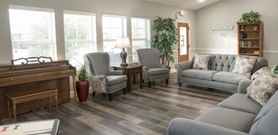 Cozy common area with seating and piano