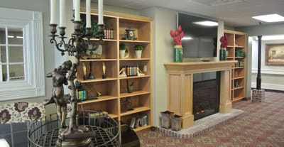 Interior view of a cozy common area with a fireplace