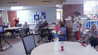 Residents enjoying a live performance in the common area