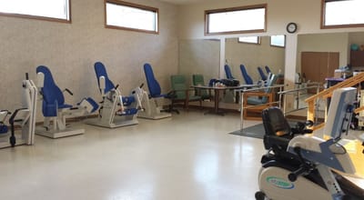 Therapy room with exercise equipment