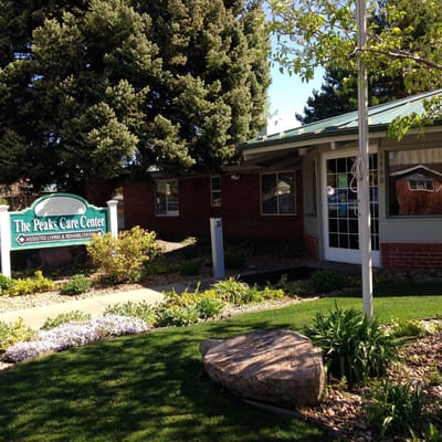 Exterior view of Peaks Care Center entrance and signage