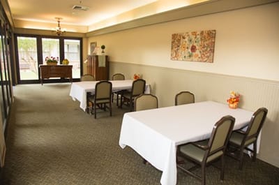 Bright interior common area with tables and chairs
