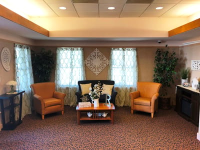 Comfortable common area with seating and décor