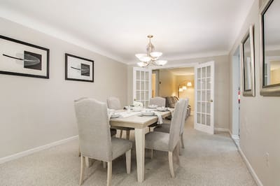 Dining area with elegant table setting and decor