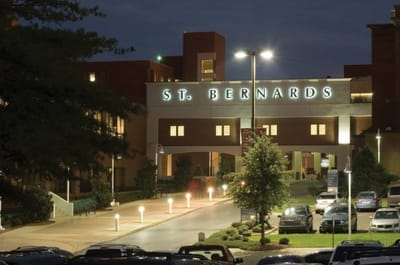 Exterior view of St. Bernards Medical Center at night