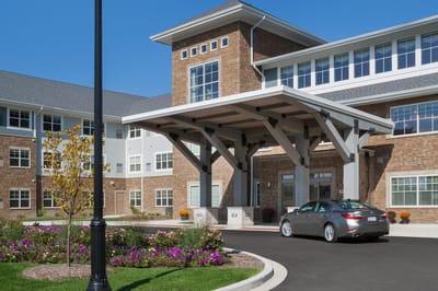 Exterior view of the facility with landscaped entrance