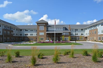 Exterior view of StoryPoint Schererville with landscaping