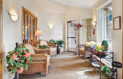 Welcoming lobby area with seating and plants