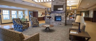 Cozy common area with seating and fireplace