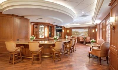 Interior view of a cozy common area with seating and decor