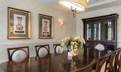 Elegant dining room setup with floral centerpiece