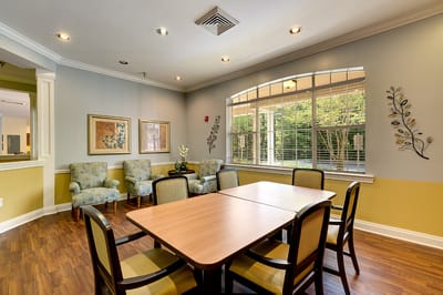 Bright common area with seating and natural light
