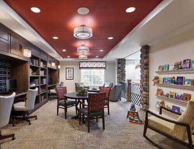 Interior of a cozy common area with bookshelves