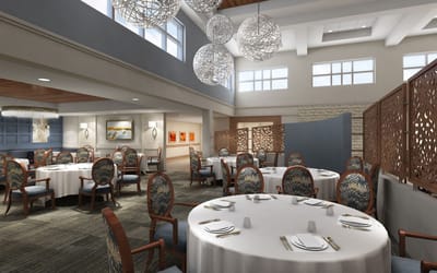 Elegant dining room with decorated tables and lighting