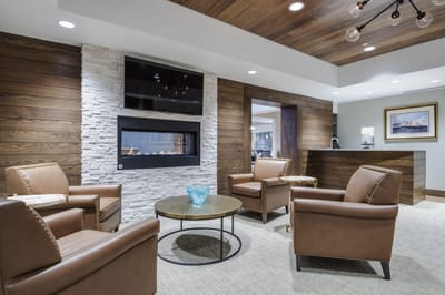 Welcoming lounge area with seating and fireplace