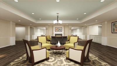 Bright common area with seating and artwork