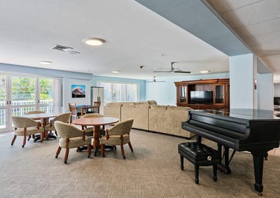Common area with seating and a piano