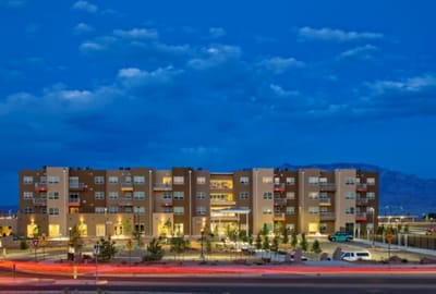 Exterior view of assisted living facility at dusk