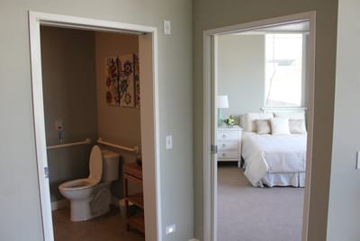 Interior view of a resident's room and bathroom