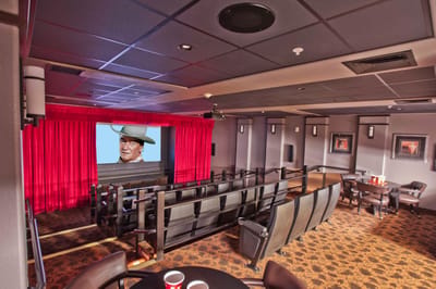 Comfortable movie screening room with a large screen