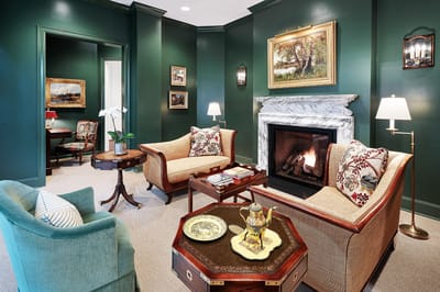 Cozy lounge area with seating and fireplace