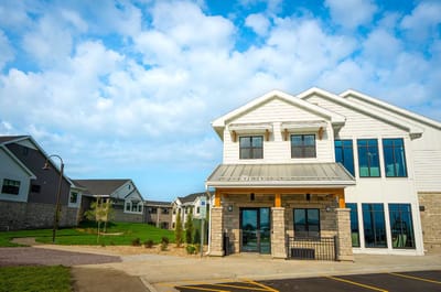 Exterior view of The Village of Harmony Hill building