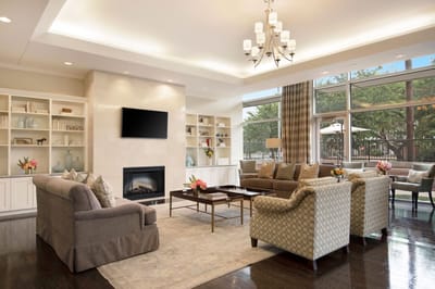 Bright common area with comfortable seating and window view
