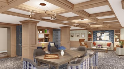 Interior common area with seating and bookshelves