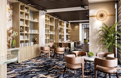 Modern lobby area with seating and bookshelves