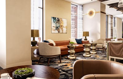 Interior view of a stylish common area with seating