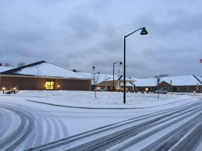 Exterior view of the Trinity Elms facility in winter