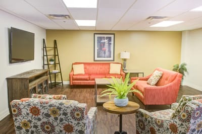 Interior lounge area with cozy furniture and decor