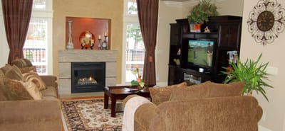 Cozy common area with seating and a fireplace